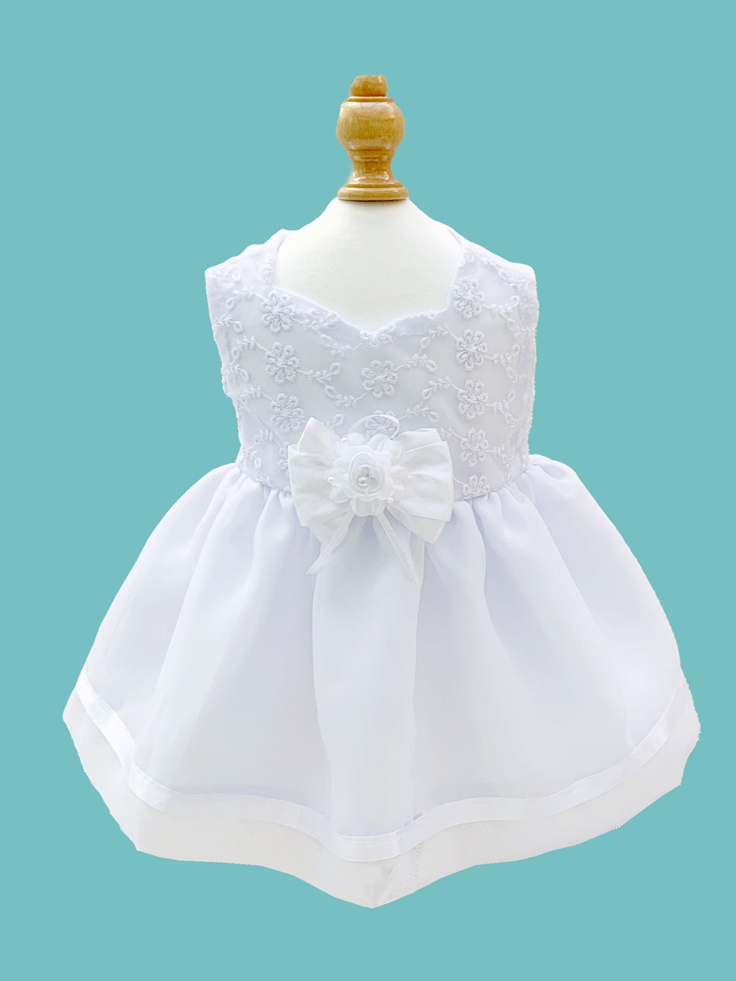 Vestido desmangado con flores bordadas labrado