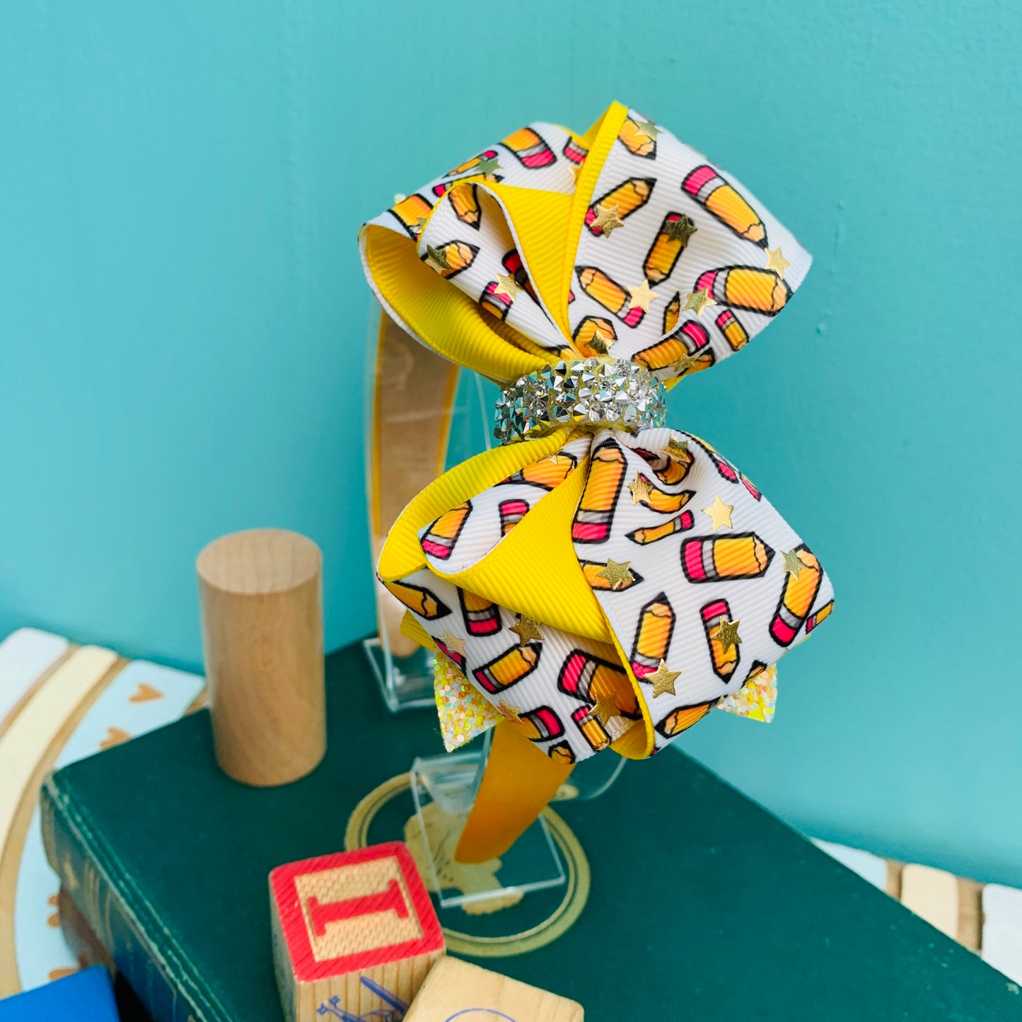 50%OFF Diadema temática Escolares Amarilla