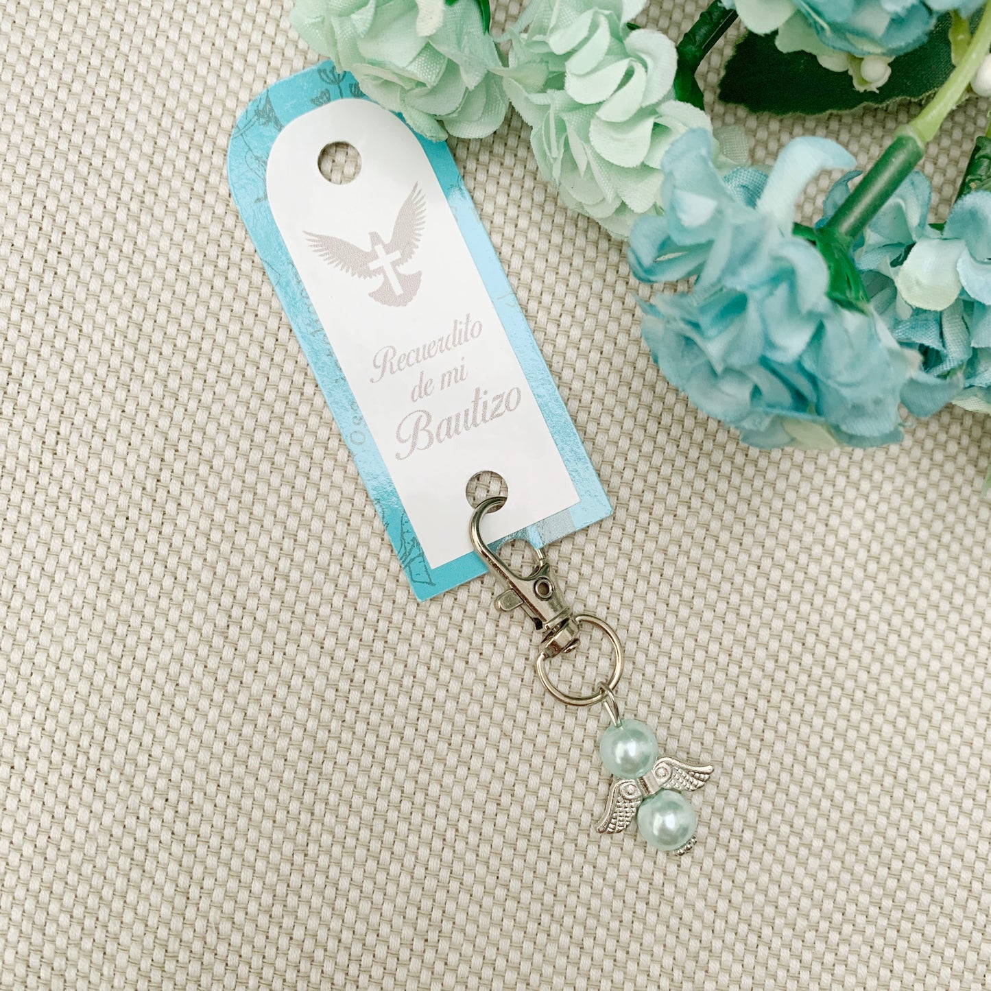 Llavero sencillo color celeste Angel de la guarda