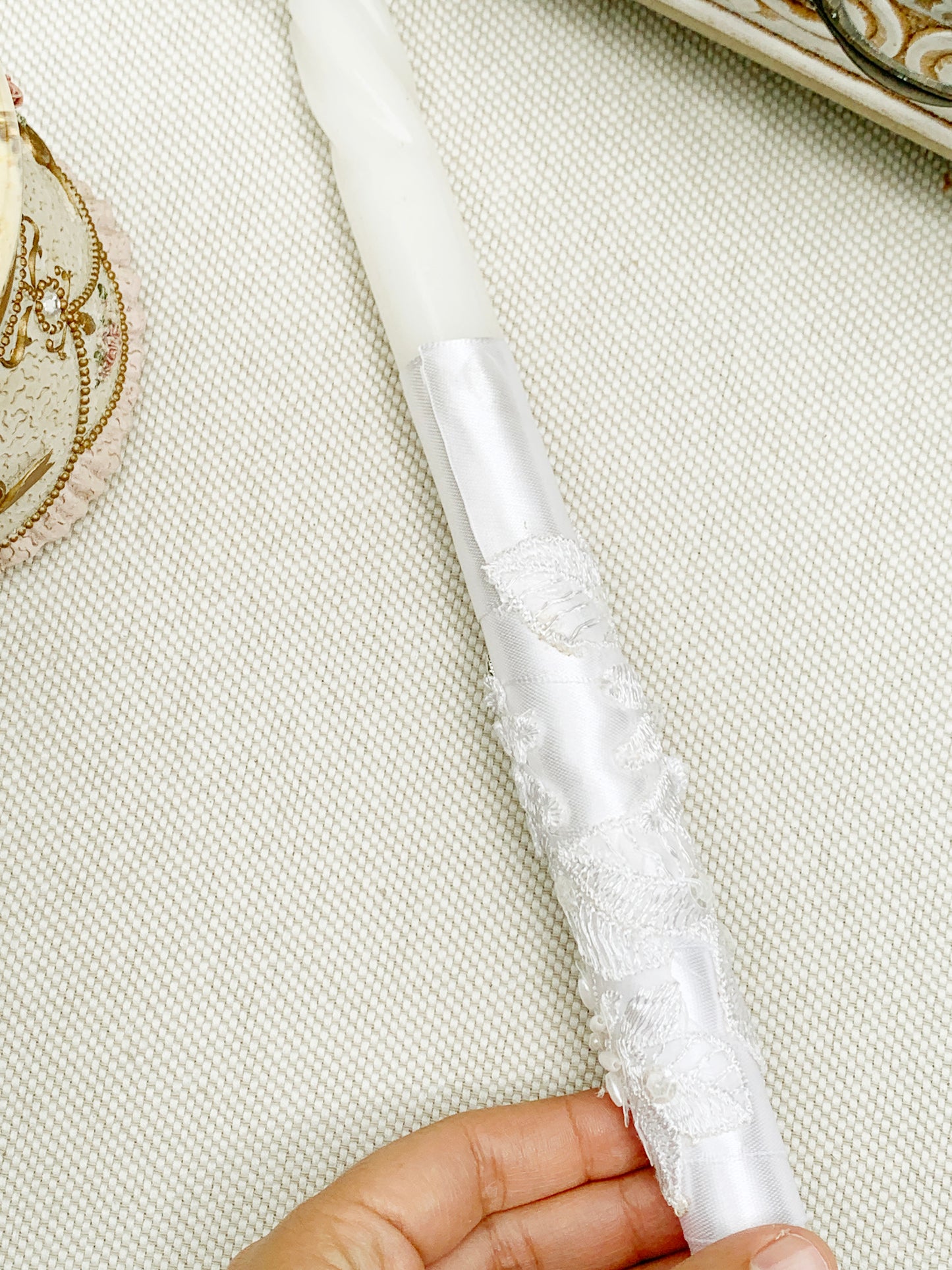 Candela diseño con conchitas y cruz plateadas °