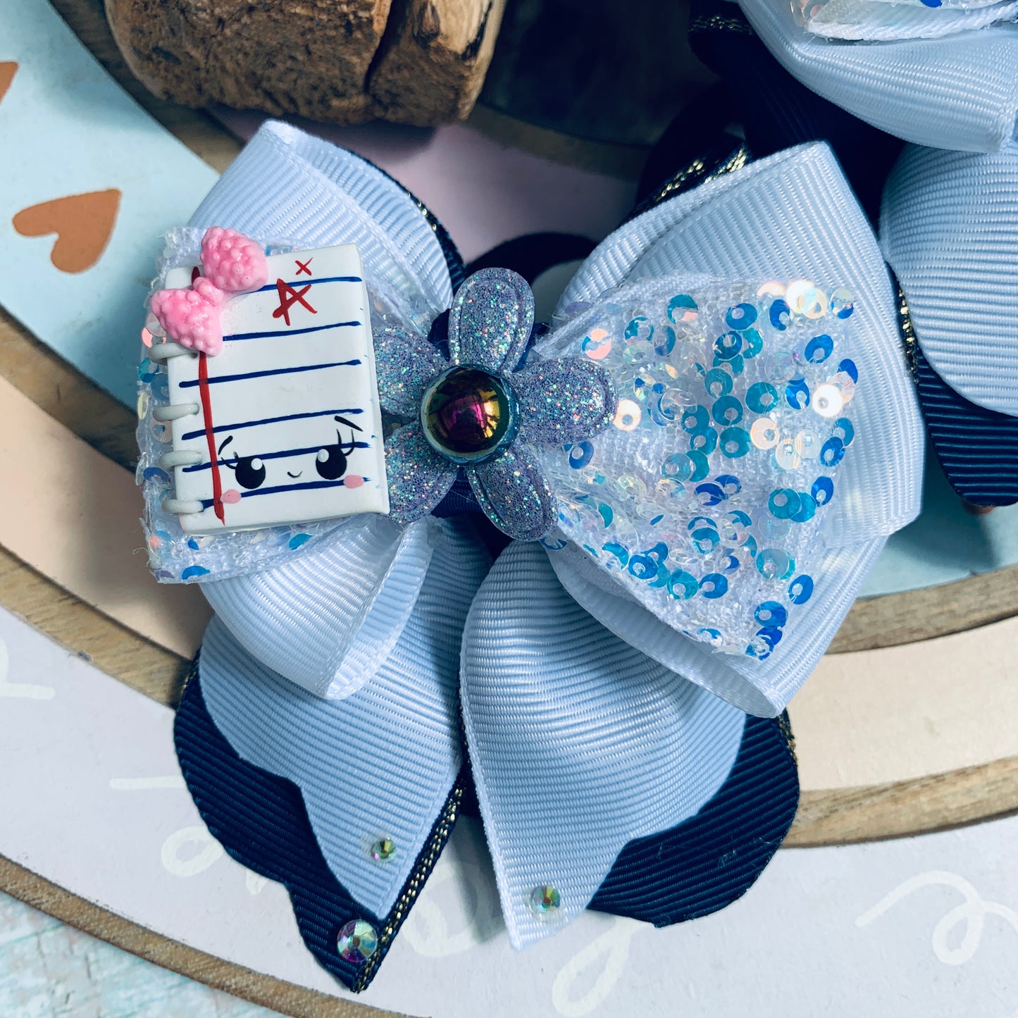 Par de colitas con lacitos para Escuelita | Cuadernito de apuntes