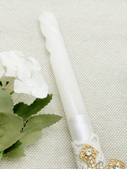 Candela torneada con cruz en pedrería