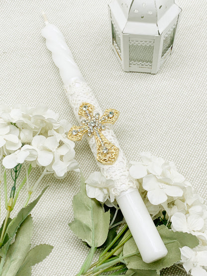 Candela torneada con cruz dorada en pedrería