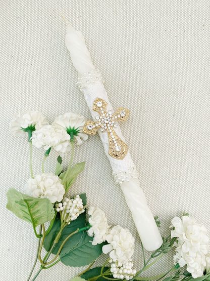 Candela torneada con cruz dorada en pedrería