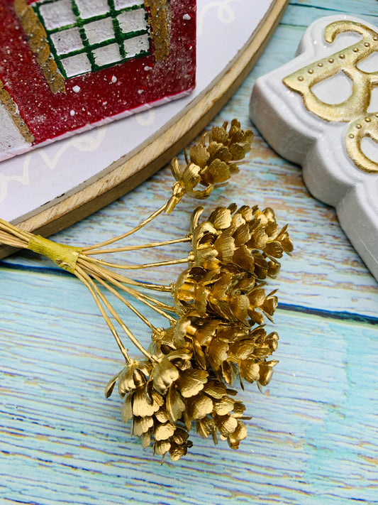 Flor navidad dorada (10 unidades x ramito)