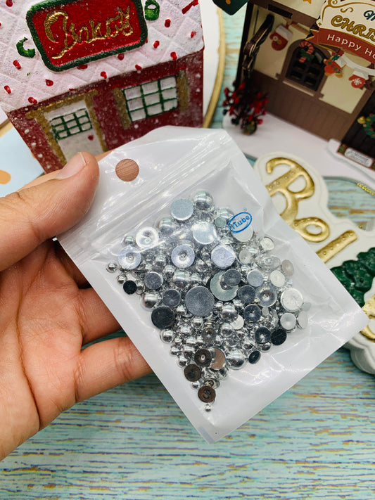 Pedrerías plateado diferentes tamaños en paquete