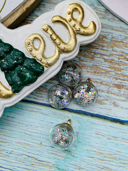 Bolita shaker estrellitas plateada (paquete 4 unidades)