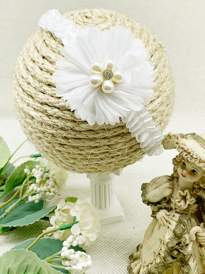 Vincha espiral con detalle en pedrería