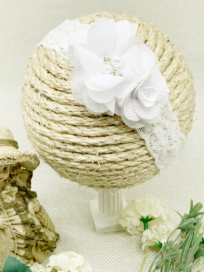 Vincha de banda ancha con flor trebol