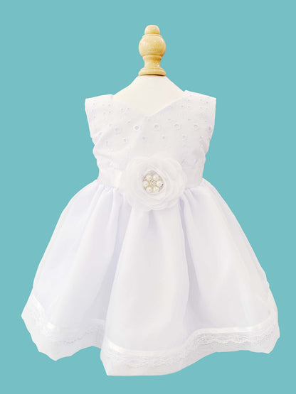 Vestido desmangado con flor